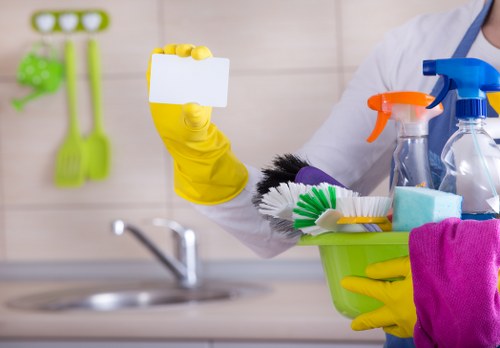 Carpet cleaning team applying safety procedures during a service